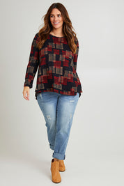 Model Laura wearing size 14 of The Printed Knit Swing Tee in colour Navycheck (Blue), from the front, showing the whole outfit