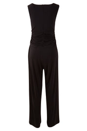 Product shot of The Cross Waist Jumpsuit in colour Black (Black), from the back
