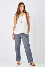 Model Anna wearing size 8 of The Drawstring Linen Pant in colour Navy (Blue), from the front, showing the whole outfit