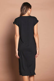 Model Madeline wearing size 10 of The Mid Length Tee Dress in colour Black (Black), from the back