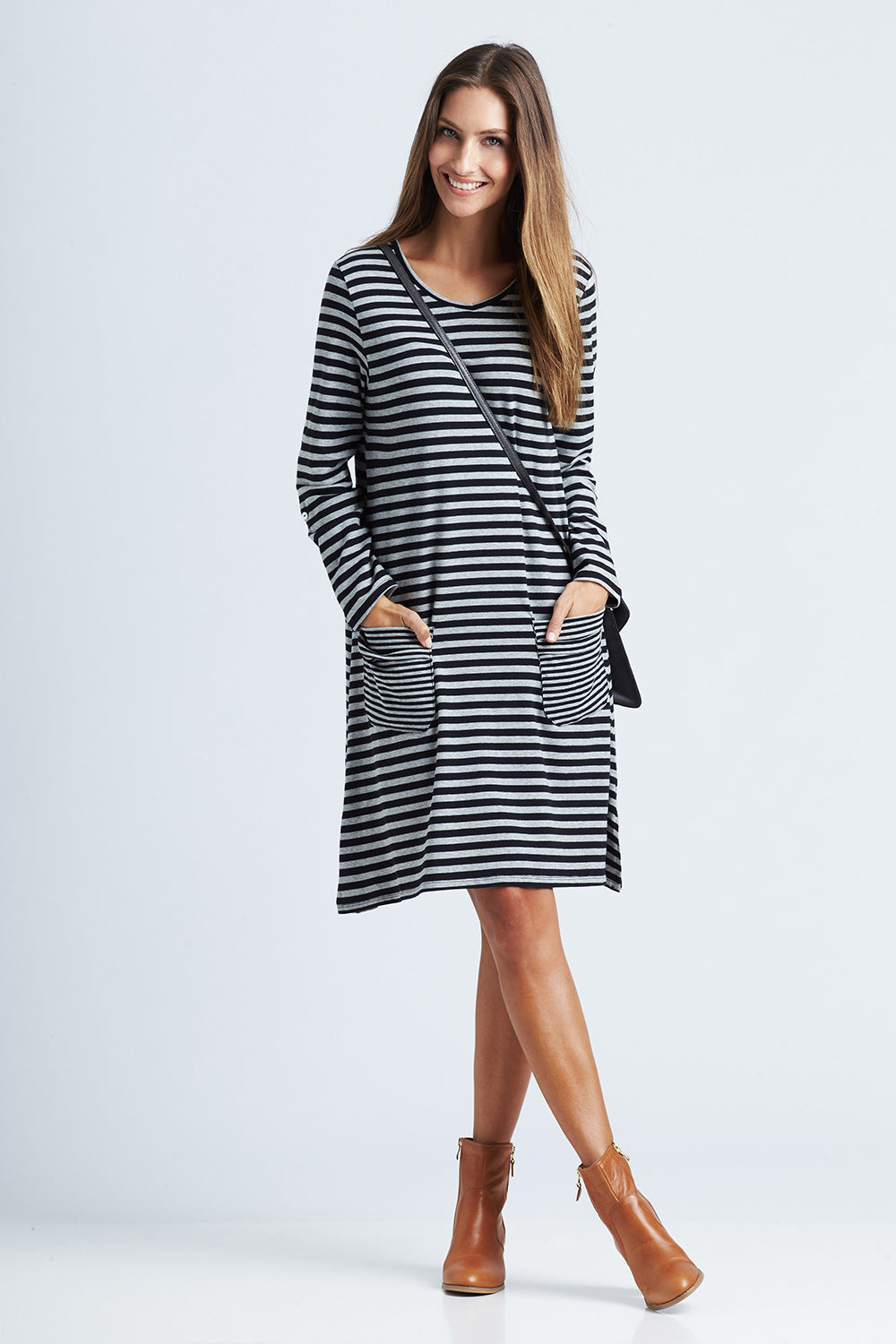 Model Anna wearing size 8 of The Stripe Swing Dress in colour BlackGrey (Grey), from the front, showing the whole outfit