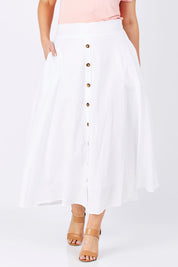 Model Jess wearing size 12 of The Button Up Midi Skirt in colour White (White), from the front, cropped image