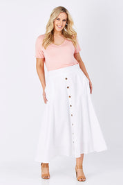 Model Jess wearing size 12 of The Button Up Midi Skirt in colour White (White), from the front, showing the whole outfit