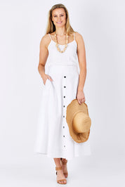 Model Maddy wearing size 10 of The Button Up Midi Skirt in colour White (White), from the front, showing the whole outfit