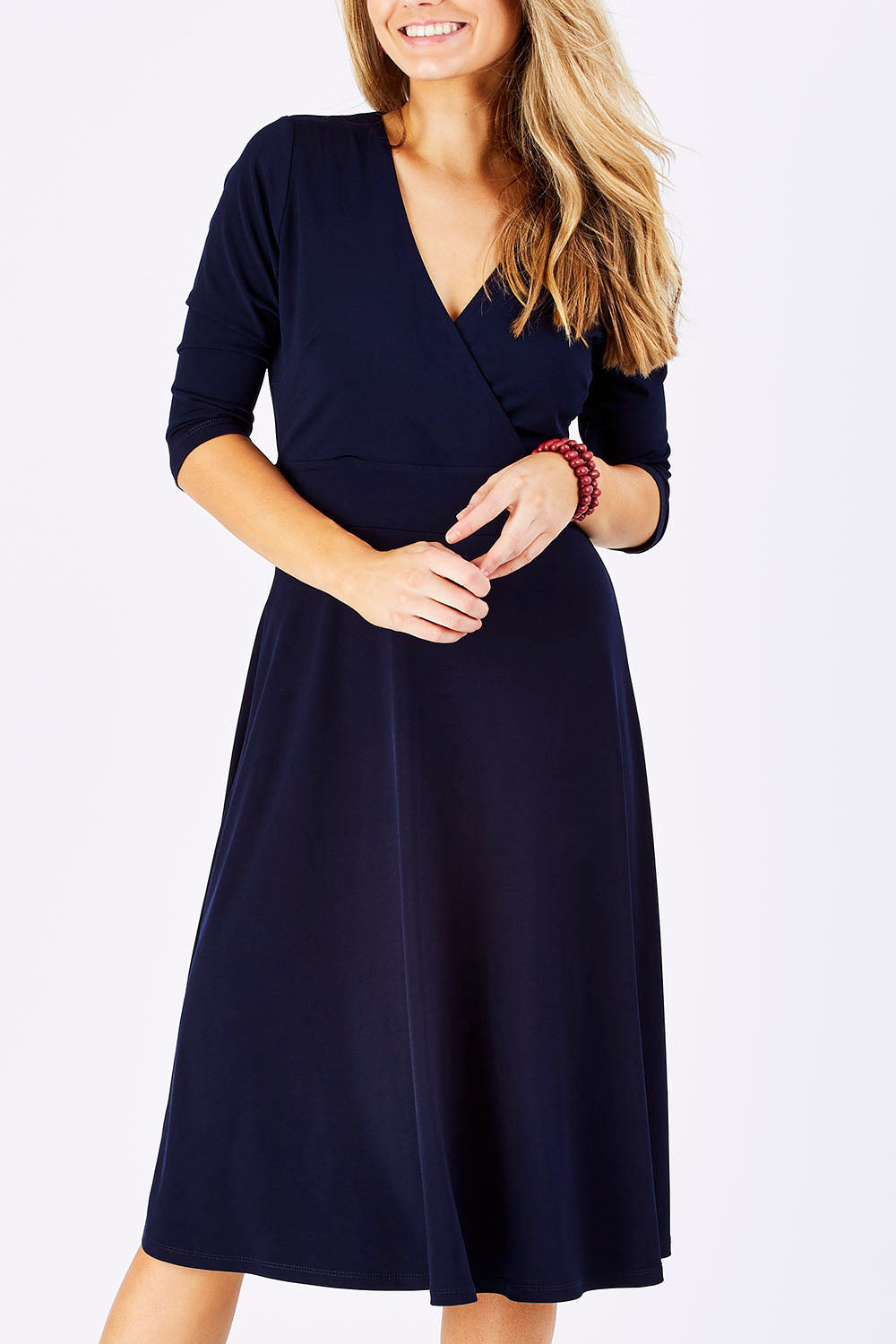 Model Marnee wearing size 10 of The 3/4 Sleeve Jersey Wrap Dress in colour Navy (Blue), from the front, showing the whole outfit