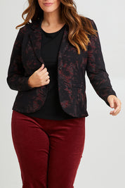 Model Laura wearing size 14 of The Printed Ponte Blazer in colour Blackred (Black), from the front, cropped image