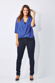 Model Laura wearing size 12 of The Cross Over Blouse in colour RoyalBlue (Blue), from the front, showing the whole outfit