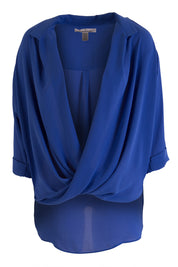 Product shot of The Cross Over Blouse in colour RoyalBlue (Blue), from the front