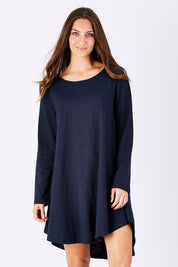 Model Anna wearing size 10 of The Long Sleeve Swing Dress in colour Navy (Blue), from the front, cropped image