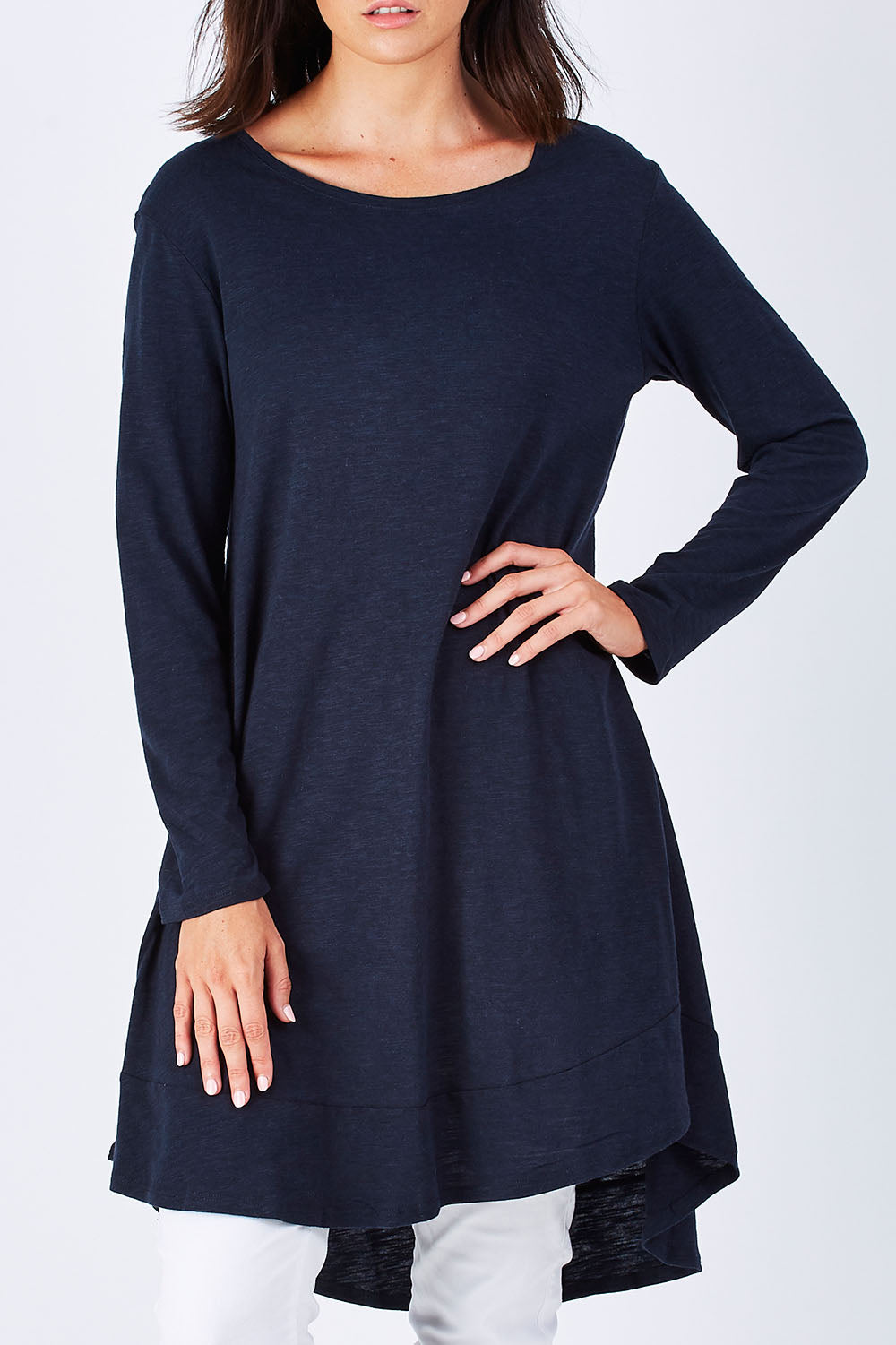 Model Perrie wearing size 10 of The Long Sleeve Swing Dress in colour Navy (Blue), from the front, cropped image