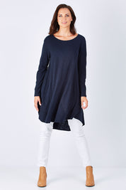Model Perrie wearing size 10 of The Long Sleeve Swing Dress in colour Navy (Blue), from the front, showing the whole outfit