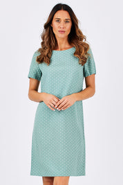 Model Clementine wearing size 10 of The Linen Blend Shift Dress in colour MintSpot (Green), from the front, cropped image