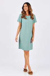 Model Clementine wearing size 10 of The Linen Blend Shift Dress in colour MintSpot (Green), from the front, showing the whole outfit