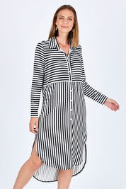 Model Riina wearing size 10 of The Midi Jersey Shirt Dress in colour BlkWhite (Black), from the front, cropped image