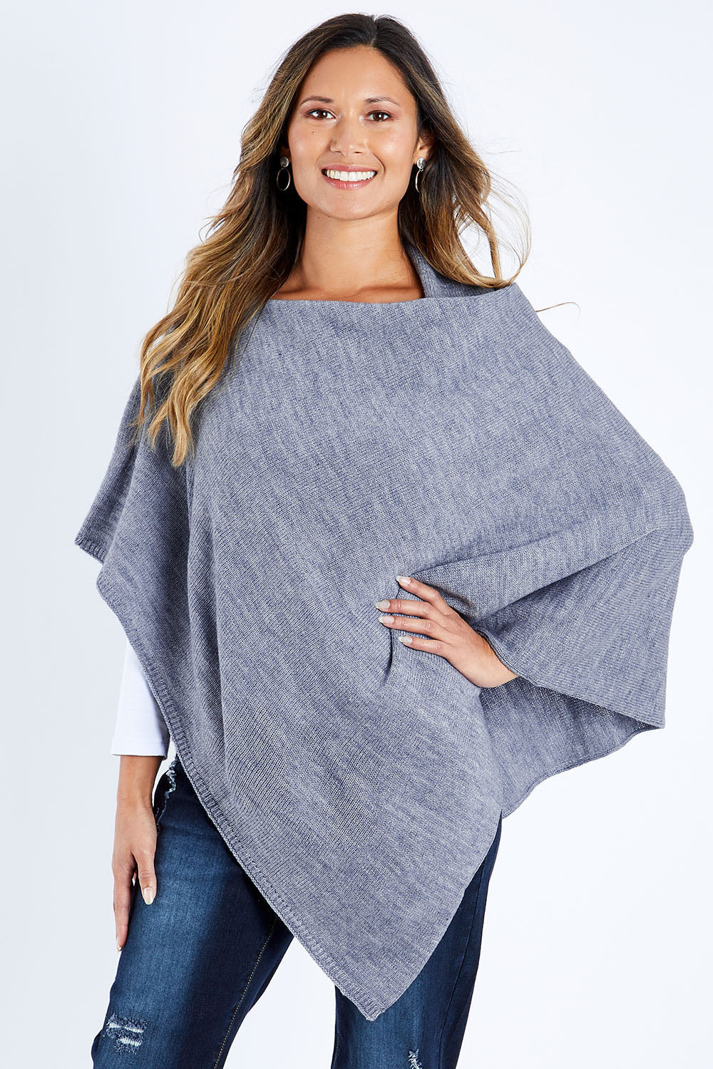 Model Kimberley wearing size S of The Perfect Poncho in colour Bluemarle (Blue), from the front, cropped image