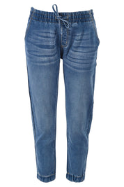 Product shot of The Pull On Jogger Jean in colour Denim (Blue), from the front
