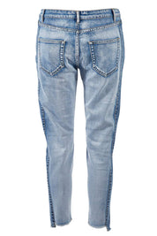 Product shot of The Step Hem Jean in colour Blue (Blue), from the back