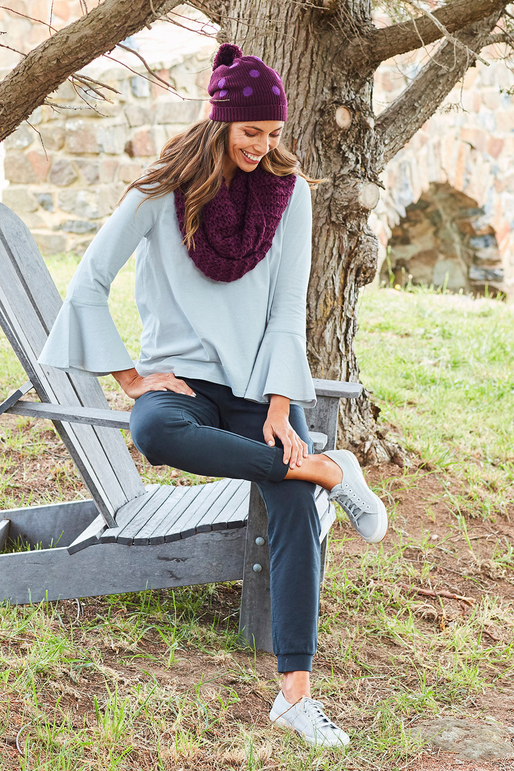 Model Amanda wearing size 10 of The Bell Sleeve Top in colour Grey (Grey), from the front, showing the whole outfit