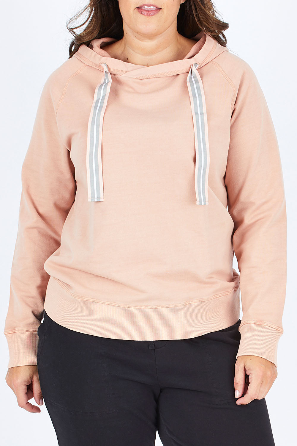 Model Stacey wearing size 12 of The Tie Detail Hoody in colour Pink (Black), from the front, cropped image