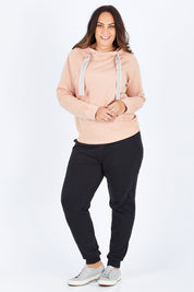Model Stacey wearing size 12 of The Tie Detail Hoody in colour Pink (Black), from the front, showing the whole outfit
