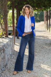 Model Emma wearing size 10 of The Bootcut Jean in colour Drkdenim (Blue), from the front, showing the whole outfit