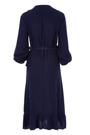 Product shot of The Midi Wrap Dress in colour Navy (Black), from the back