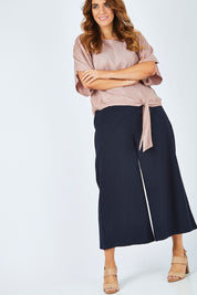 Model Laura wearing size 14 of The Keepsake Culotte in colour Navy (Blue), from the front, showing the whole outfit