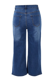Product shot of The Wide Leg Jean in colour Denim (Blue), from the back