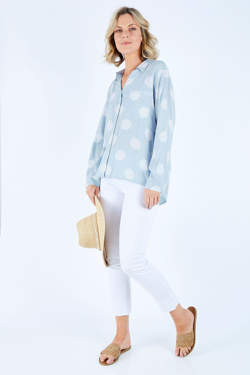 Model Chelsea wearing size 10 of The Relax Spot Shirt in colour Chambspot (Blue), from the front, showing the whole outfit