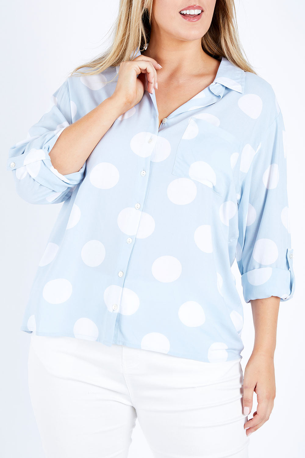 Model Jess wearing size 14 of The Relax Spot Shirt in colour Chambspot (Blue), from the front, cropped image