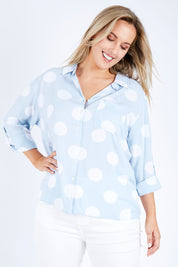 Model Jess wearing size 14 of The Relax Spot Shirt in colour Chambspot (Blue), from the front, cropped image