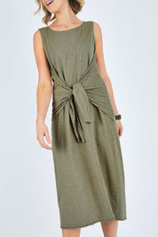Model Chelsea wearing size 10 of The Tie Waist Tank Dress in colour Khaki (Green), from the front, cropped image