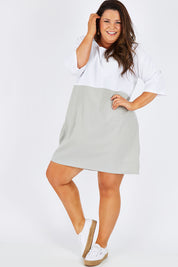 Model Stacey wearing size 16 of The Spliced Shift Dress in colour Grey (Grey), from the front, showing the whole outfit
