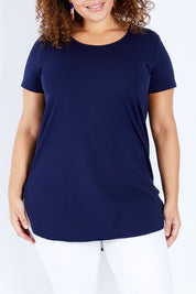Model Jess wearing size 16 of The Boyfriend Tunic Tee in colour Navy (Blue), from the front, cropped image