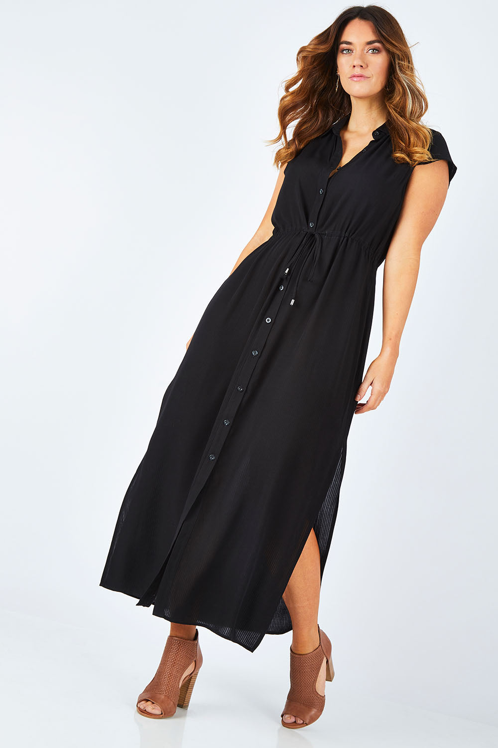 Model Laura wearing size 14 of The Button Up Maxi in colour Black (Black), from the front, showing the whole outfit