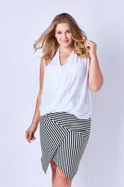 Model Kate wearing size 16 of The Contrast Striped Skirt in colour BlackWhite (Black), from the front, cropped image