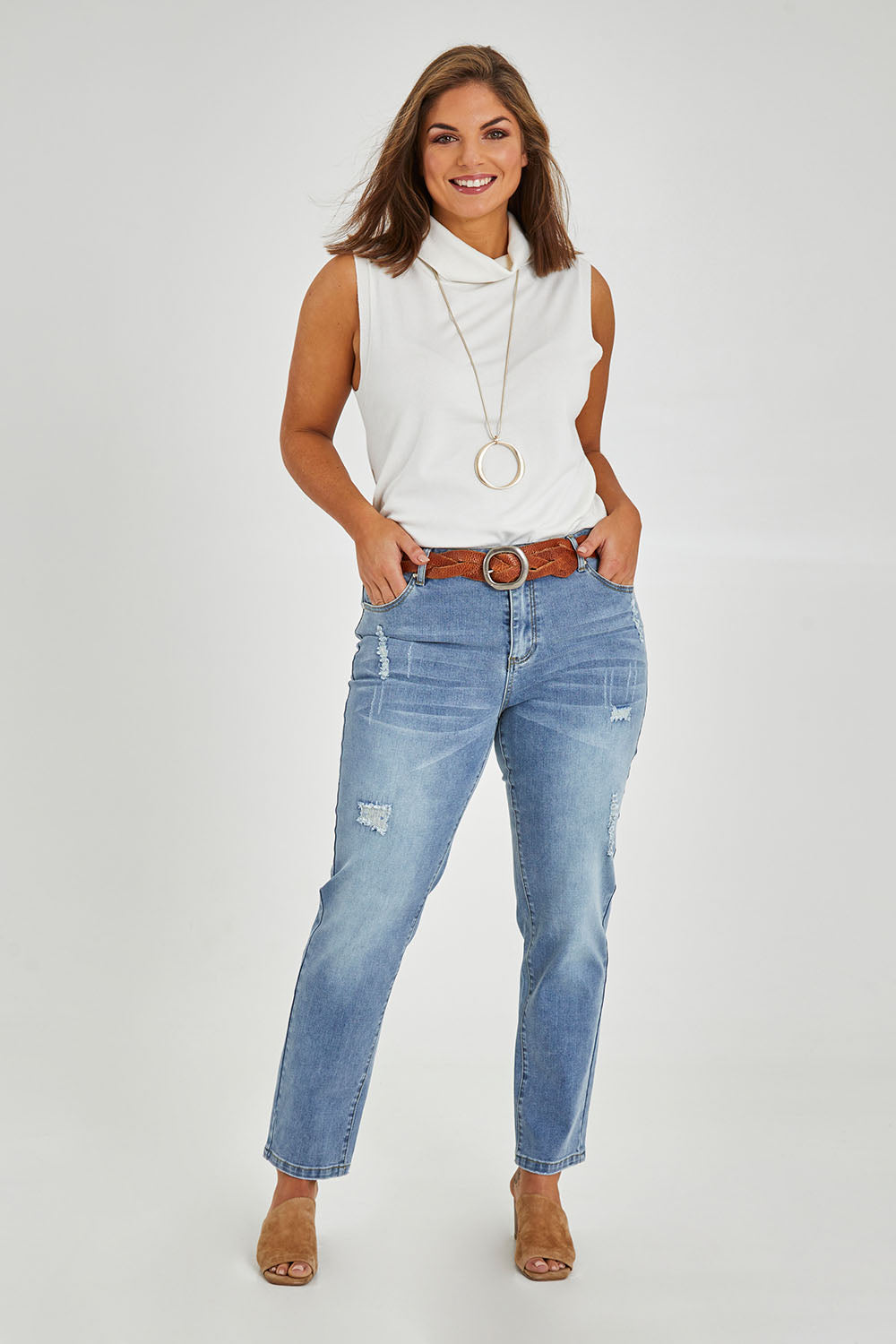 Model Monique wearing size 14 of The Distressed Boyfriend Slim Leg Jean in colour Blue (Blue), from the front, showing the whole outfit
