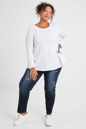Model Alexis wearing size 16 of The Distressed Boyfriend Jean in colour Darkdenim (Blue), from the front, showing the whole outfit
