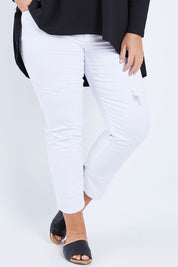 Model Fiona wearing size 16 of The Distressed Boyfriend Jean in colour White (White), from the front, cropped image
