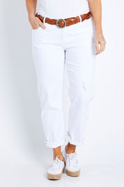 Model Laura wearing size 14 of The Distressed Boyfriend Jean in colour White (White), from the front, cropped image
