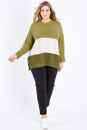 Model Fiona wearing size XL of The Drape Knit Jumper in colour Khaki (Green), from the front, showing the whole outfit