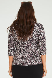 Model Laura wearing size 14 of The Everyday Printed Blazer in colour Mutedpink (Pink), from the back
