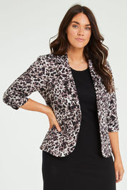 Model Laura wearing size 14 of The Everyday Printed Blazer in colour Mutedpink (Pink), from the front, cropped image