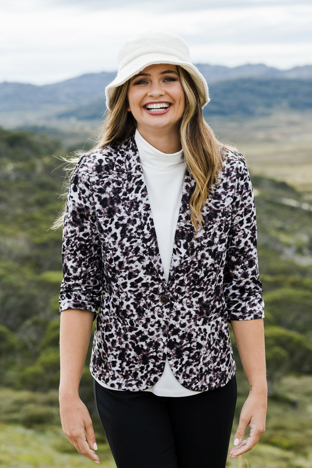 Model Tahlia wearing size 10 of The Everyday Printed Blazer in colour Mutedpink (Pink), from the front, showing the whole outfit
