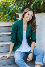 Model Amanda wearing size 10 of The Everyday Blazer in colour Deepgreen (Green), from the front, showing the whole outfit