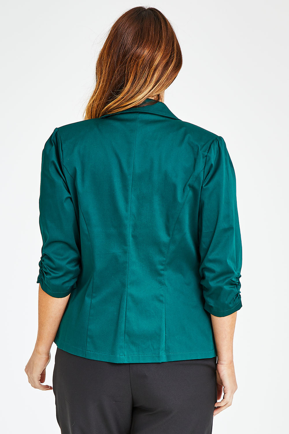 Model Laura wearing size 14 of The Everyday Blazer in colour Deepgreen (Green), from the back