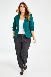 Model Laura wearing size 14 of The Everyday Blazer in colour Deepgreen (Green), from the front, showing the whole outfit