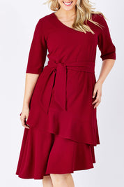 Model Jess wearing size 14 of The Layer Midi Dress in colour DeepRed (Red), from the front, cropped image