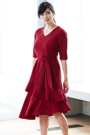 Model Miranda wearing size 10 of The Layer Midi Dress in colour DeepRed (Red), from the front, showing the whole outfit