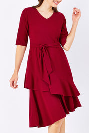 Model Rebecca wearing size 10 of The Layer Midi Dress in colour DeepRed (Red), from the front, cropped image
